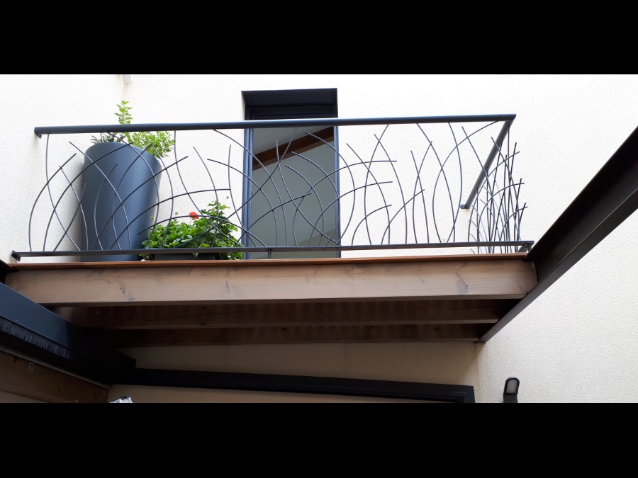 garde-corps métal ouvragé pour un balcon terrasse réalisé par Thomere Facilities